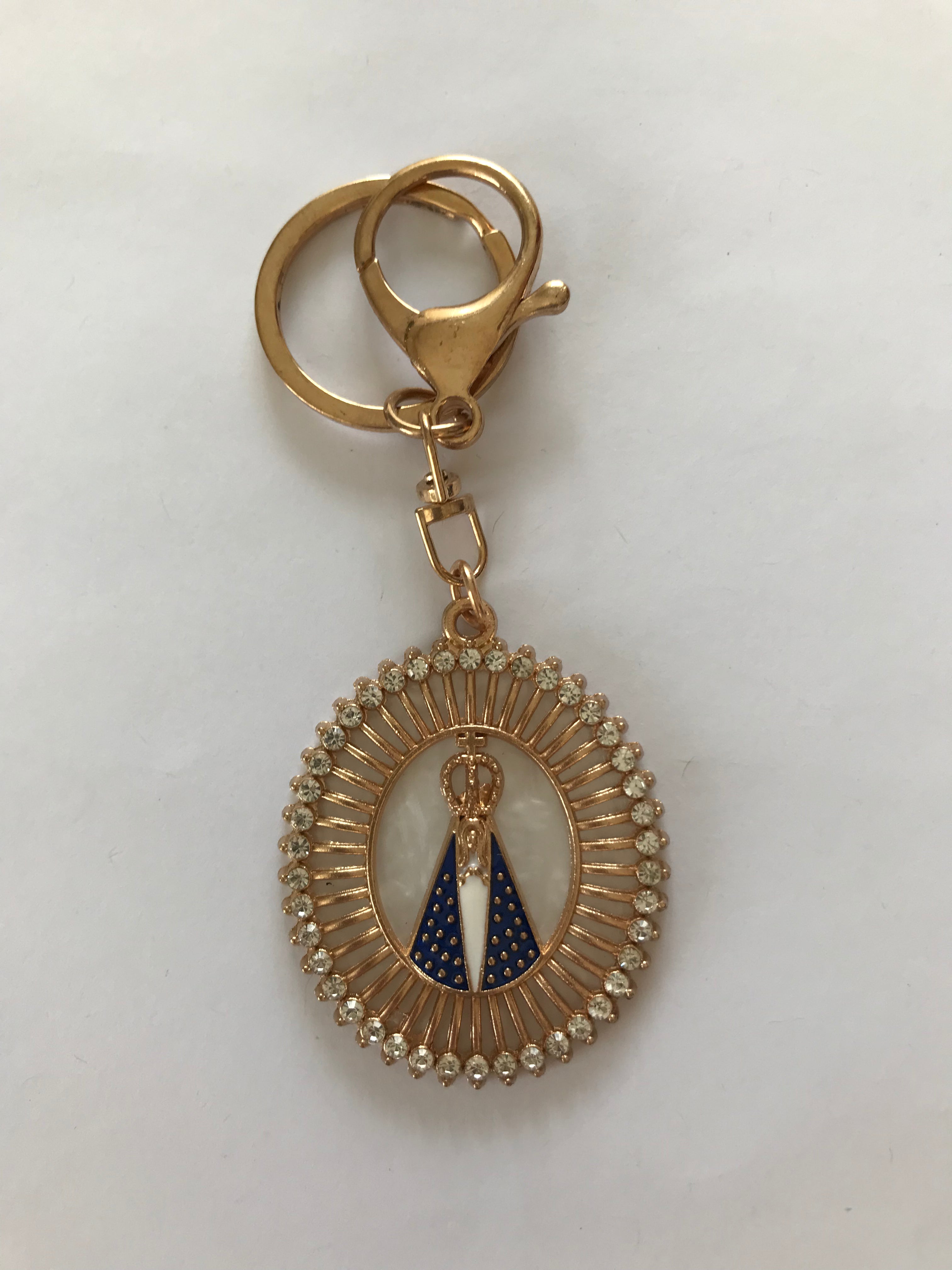 CHAVEIRO N.S.APARECIDA RAIOS MADREPEROLA COM MOSQUETAO DOURADO